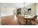 Dining room with stone fireplace and backyard views at 3135 La Mesa Dr, Henderson, NV 89014