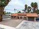 Charming single-story residence with a unique terracotta roof and a welcoming arched entryway at 3135 La Mesa Dr, Henderson, NV 89014