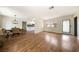 Bright and open living room with new floors and a dining area at 3135 La Mesa Dr, Henderson, NV 89014