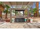 The outdoor kitchen features a built-in grill, countertop space, and ample storage at 3135 La Mesa Dr, Henderson, NV 89014