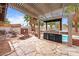 The outdoor kitchen features a built-in grill, countertop space, and ample storage at 3135 La Mesa Dr, Henderson, NV 89014