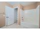Clean bathroom featuring shower over tub and closet storage at 3141 Diamond Crest Ln, Henderson, NV 89052