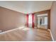 Bedroom with mirrored closet, modern floors, and bright, natural light at 3151 Soaring Gulls Dr # 2050, Las Vegas, NV 89128