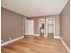 Spacious bedroom featuring wood flooring and an ensuite bathroom and walk-in closet at 3151 Soaring Gulls Dr # 2050, Las Vegas, NV 89128