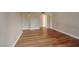 Living room featuring wood flooring, neutral walls and trim. Ready for new decor at 3151 Soaring Gulls Dr # 2050, Las Vegas, NV 89128