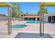 Community pool area featuring inground pool and hot tub surrounded by lounge area at 3151 Soaring Gulls Dr # 2050, Las Vegas, NV 89128