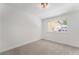 Neutral bedroom with a window showing outdoor views at 3463 Haverford Ave, Las Vegas, NV 89121