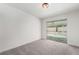 Bedroom with sliding glass doors looking out to a pool at 3463 Haverford Ave, Las Vegas, NV 89121