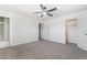 Bright bedroom features a modern ceiling fan and neutral carpeting at 3463 Haverford Ave, Las Vegas, NV 89121