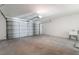 Spacious garage with a sink, concrete floors and a white sectional garage door at 3463 Haverford Ave, Las Vegas, NV 89121