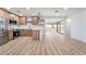 Open-concept kitchen and living space featuring stainless appliances and a view of the pool at 3463 Haverford Ave, Las Vegas, NV 89121
