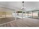 Bright living area with sliding glass doors offering views of the backyard pool and patio at 3463 Haverford Ave, Las Vegas, NV 89121