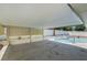 A covered patio area offers a view of the pool in the backyard, providing a relaxing outdoor space at 3463 Haverford Ave, Las Vegas, NV 89121