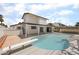 Backyard showcasing a sparkling in-ground pool, diving board, and a well-maintained outdoor living space at 3463 Haverford Ave, Las Vegas, NV 89121