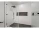 Sleek glass-enclosed shower with modern fixtures and tiled surround at 3463 Haverford Ave, Las Vegas, NV 89121