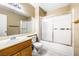 Bathroom featuring a vanity, toilet, and shower-tub combo at 371 Cambray St, Henderson, NV 89074