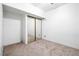 Bedroom with carpet flooring and large mirror closet at 371 Cambray St, Henderson, NV 89074