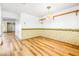Spacious dining area with hardwood flooring leading to other rooms at 371 Cambray St, Henderson, NV 89074