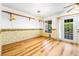 Open dining area showcasing hardwood floors and natural light, perfect for Gathering meals at 371 Cambray St, Henderson, NV 89074