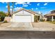 Charming single-story home featuring a two-car garage and low maintenance desert landscaping at 371 Cambray St, Henderson, NV 89074
