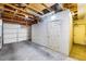 Garage features a roll up door and utility door at 371 Cambray St, Henderson, NV 89074