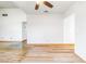 Open-concept living room with vaulted ceilings and hardwood floors at 371 Cambray St, Henderson, NV 89074