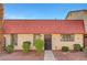 Charming townhouse with a red tile roof and well-maintained landscaping at 3907 Torsby Pl, Las Vegas, NV 89119