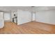Spacious living area with hardwood floors seamlessly flowing into an open kitchen at 3907 Torsby Pl, Las Vegas, NV 89119