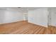 Open-concept living space with hardwood floors and neutral walls with lots of natural light at 3907 Torsby Pl, Las Vegas, NV 89119