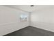 Clean and simple bedroom with neutral walls and carpet, offering a calming space at 5043 Spencer St # A, Las Vegas, NV 89119