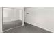 Bedroom with mirrored closet doors, providing ample storage and style at 5043 Spencer St # A, Las Vegas, NV 89119