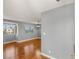 Bright living room featuring sleek wood flooring, large windows, and neutral walls for versatile decorating at 5043 Spencer St # A, Las Vegas, NV 89119