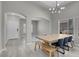 Bright open-concept dining room offers luxury vinyl floors and access to other living areas at 5228 Giallo Vista Ct, North Las Vegas, NV 89031