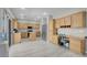 Modern kitchen features stainless steel appliances, custom cabinets, and a center island at 5228 Giallo Vista Ct, North Las Vegas, NV 89031