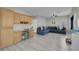 Large living room features a built-in desk, neutral walls, and comfortable seating arrangement at 5228 Giallo Vista Ct, North Las Vegas, NV 89031