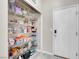 Well-stocked pantry with wire shelving, offering ample storage space and easy organization at 5228 Giallo Vista Ct, North Las Vegas, NV 89031