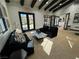 Comfortable clubhouse with sofas, lounge chairs, natural light, and inviting decor at 5528 Eleganza Ave, Pahrump, NV 89061