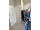 Well-organized walk-in closet features ample storage space with shelving and hanging racks at 5528 Eleganza Ave, Pahrump, NV 89061