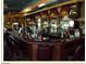 Well-stocked bar featuring ample seating and a welcoming atmosphere at 561 Carmel Valley St, Henderson, NV 89012