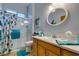 Bathroom featuring a walk-in shower, a modern vanity, and bright lighting at 561 Carmel Valley St, Henderson, NV 89012