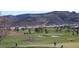 Scenic golf course community with mountain views, featuring manicured fairways and greens at 561 Carmel Valley St, Henderson, NV 89012