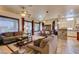 Spacious open-plan living area with living room, dining area and kitchen, perfect for entertaining at 561 Carmel Valley St, Henderson, NV 89012