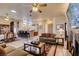 Open-concept living area with a seamless flow between the living room, dining area and kitchen at 561 Carmel Valley St, Henderson, NV 89012
