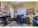 Functional office space featuring a desk, ample storage, and natural light at 561 Carmel Valley St, Henderson, NV 89012