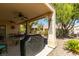 Spacious covered patio for outdoor gatherings with ceiling fans and outdoor decor at 561 Carmel Valley St, Henderson, NV 89012