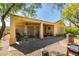 Spacious covered patio is perfect for outdoor entertaining, with a built-in grill and patio furniture at 561 Carmel Valley St, Henderson, NV 89012