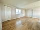 Spacious bedroom with a closet and plenty of natural light from the window at 604 N Minnesota St, Las Vegas, NV 89107