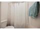 Bathroom featuring a tub and shower combination with a decorative white shower curtain at 6148 Vista Teal Ln, Las Vegas, NV 89115