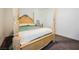 Bedroom showcasing a beautiful four-poster bed and elegant wooden dressers at 6148 Vista Teal Ln, Las Vegas, NV 89115