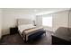 This bedroom features a padded headboard, a bench and a window for lots of natural light at 6148 Vista Teal Ln, Las Vegas, NV 89115